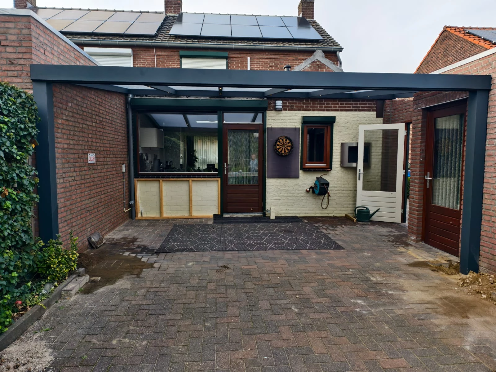 Polycarbonaat veranda aan huis geplaatst door AluSolutions